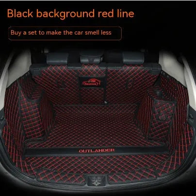 Mitsubishi Outlander custom boot liner with 3D raised edges and non-slip surface in a vehicle boot.