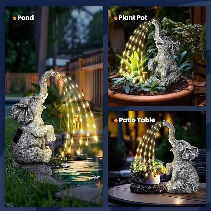 Outdoor resin elephant garden statue with integrated LED light strip.