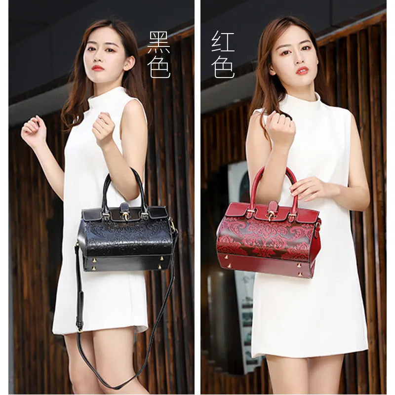 Genuine leather women's vintage crossbody bag in oval shape with embossed detailing