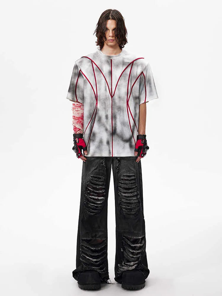 Women's short sleeve t-shirt with padded shoulders and raised line patchwork design on a round neck.
