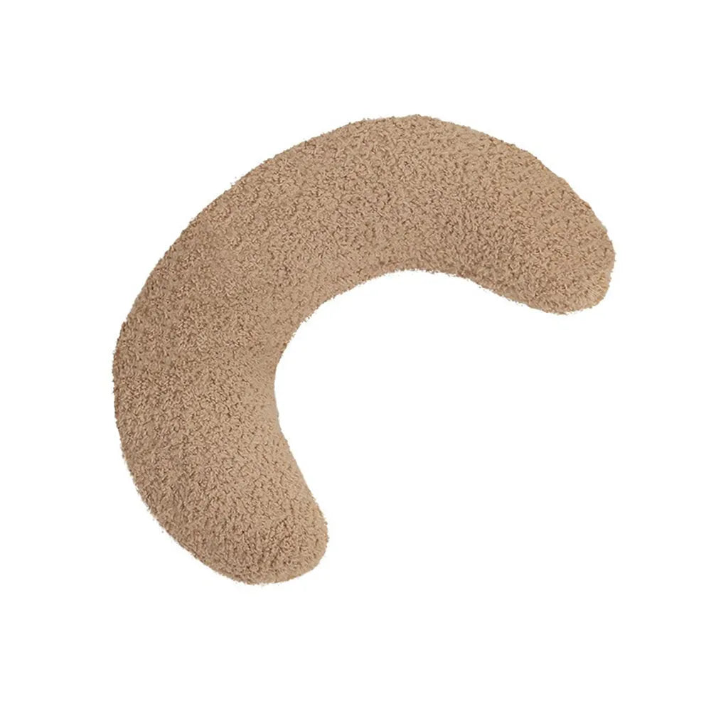 U-shaped blue cat pillow with adjustable collar for cervical support on a sofa