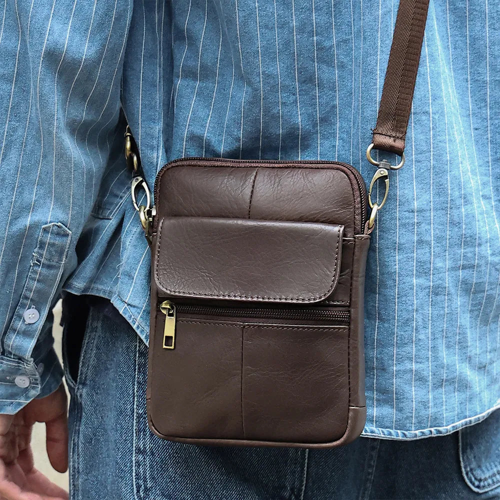 Men's brown leather crossbody shoulder bag with visible sewing lines and polyester cotton lining