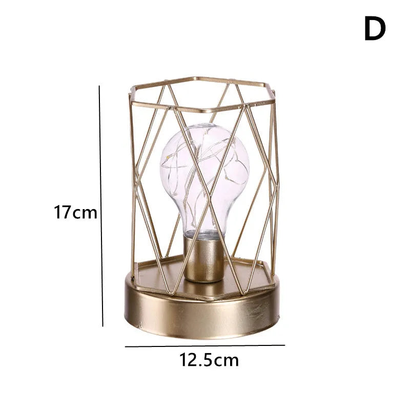 Geometric iron light bulb candle ornament with electroplated metallic finish, hanging as Nordic style home decor