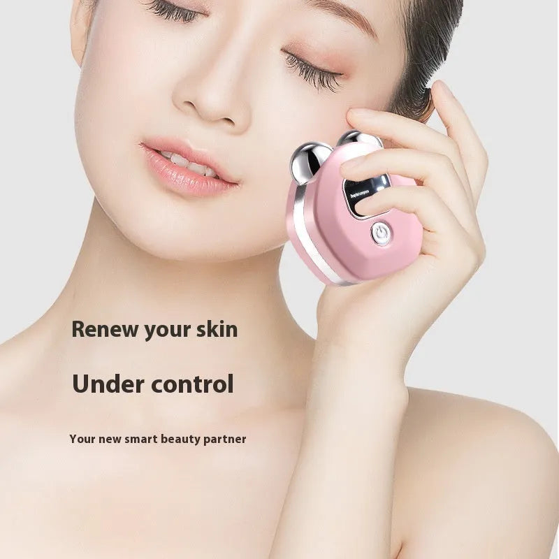 White portable facial massager with double rollers and micro current hot compress function.