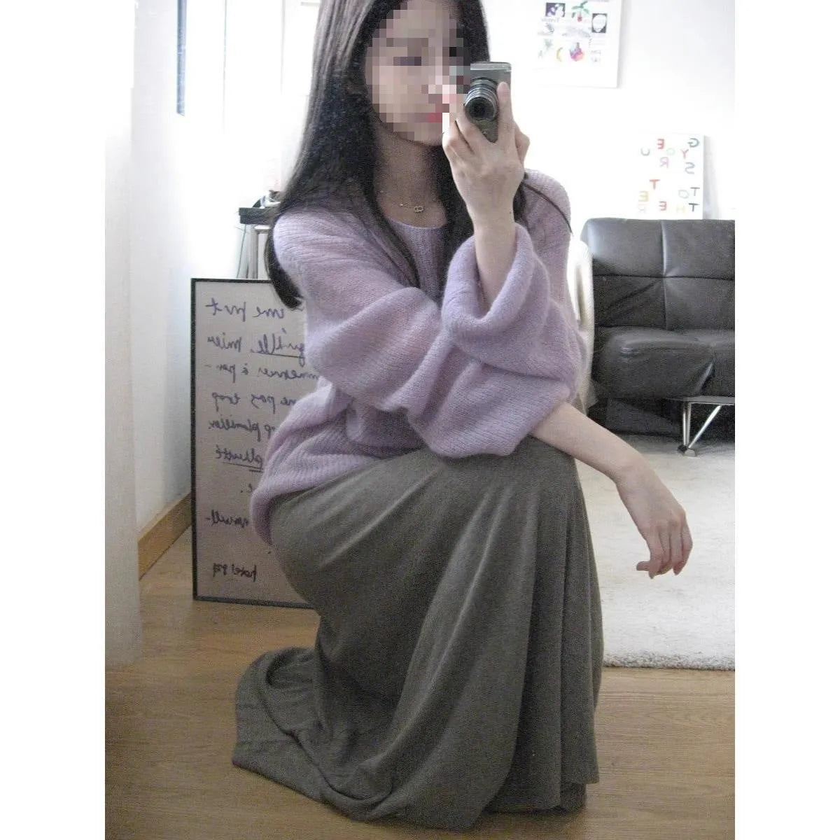 Purple lightweight women's blouse with hollow-out pattern and flared princess sleeves on a mannequin.