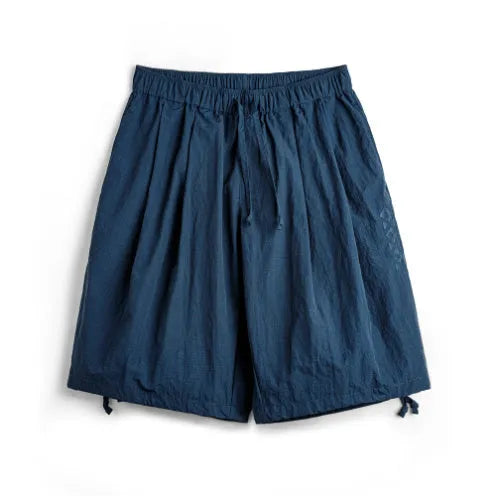Prussian Blue men's loose fit beach shorts with embroidered designs