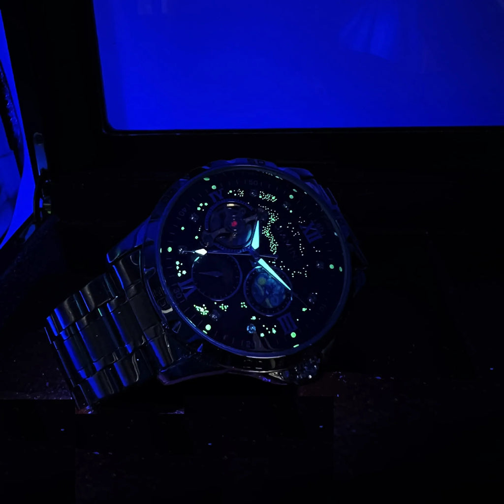 Men's automatic mechanical watch with rose gold case and black dial showing large display