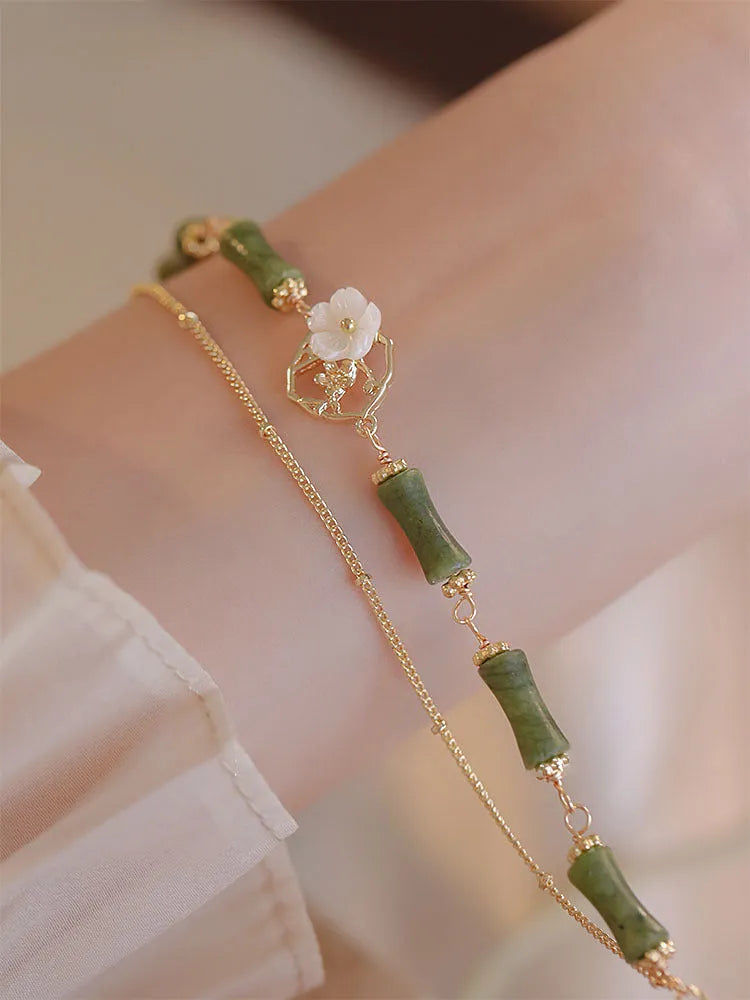 Natural green olivine stone bracelet with twin bells and double layer design
