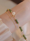 Natural green olivine stone bracelet with twin bells and double layer design