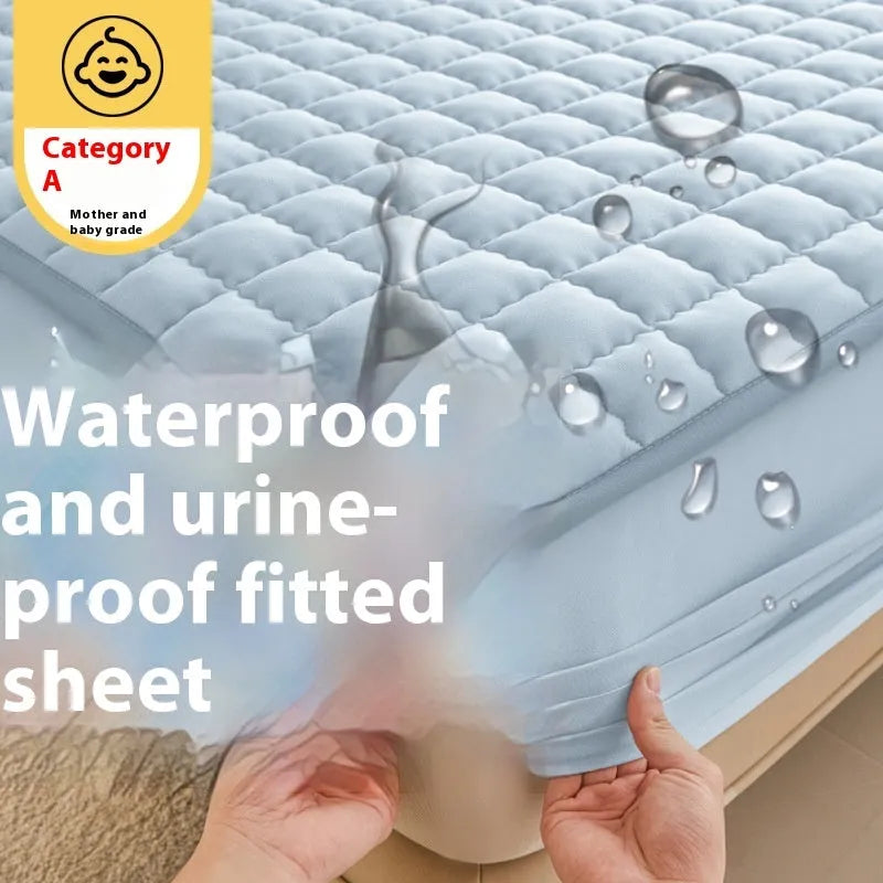 Washed cotton waterproof fitted sheet in light grey colour with elasticated corners on a mattress