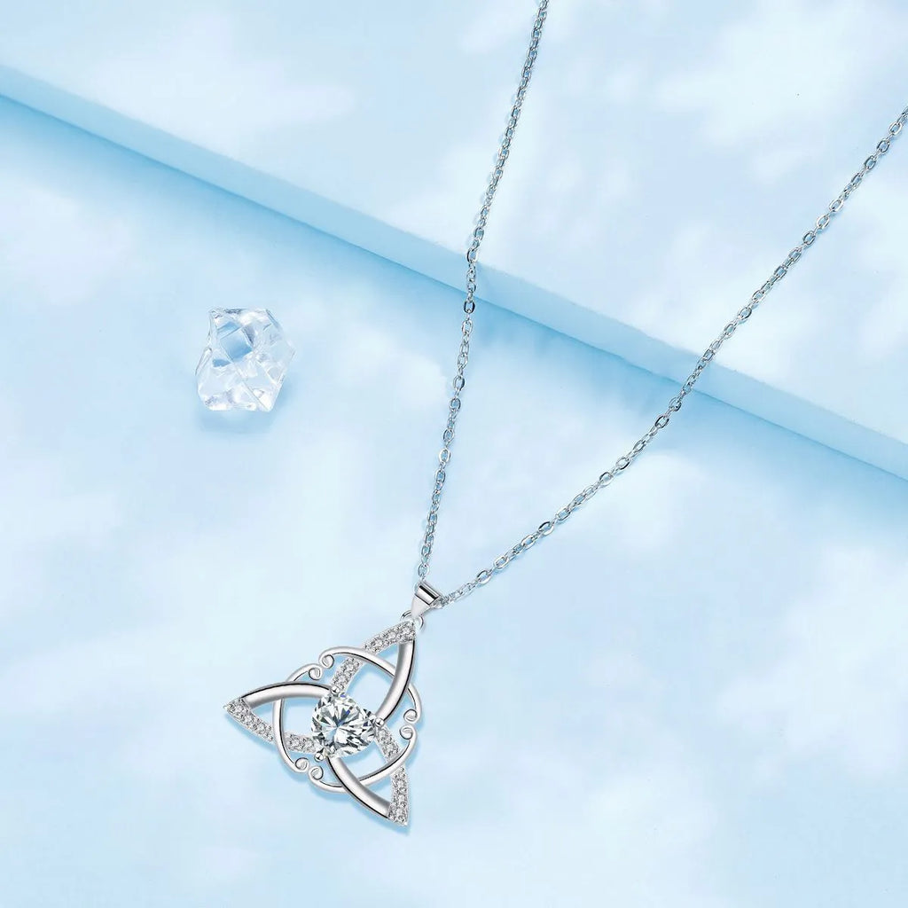 Geometric Celtic knot pendant necklace for women in a choice of blue, lvzuan, red diamond, or white diamond finish.