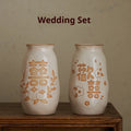 Chinese hand-painted ceramic vase with persimmon fruit designs on wooden desktop