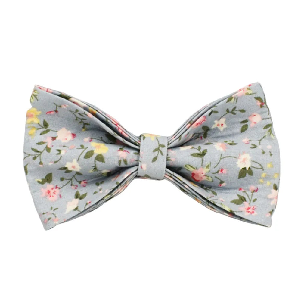 Floral polyester cotton dog collar set with matching leash, vest, bow, and poop bag accessories