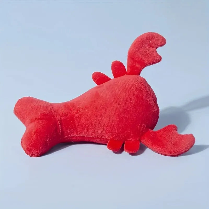 Red lobster stuffed squeaky dog toy for small medium breeds on white background