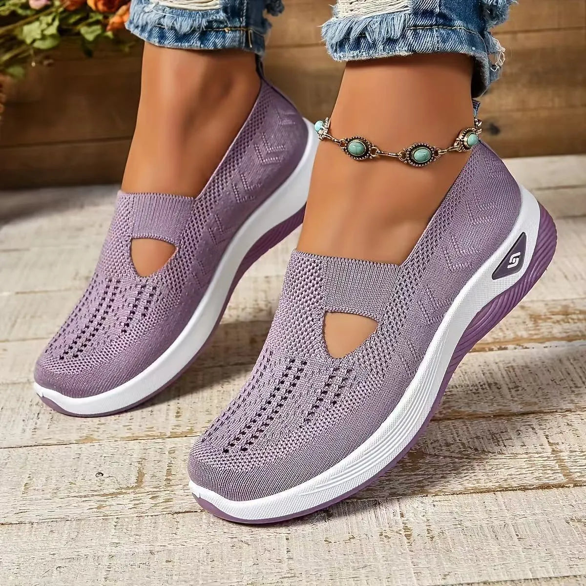 Women's casual mesh flat shoes with a T-bar strap and round toe in multiple colours.
