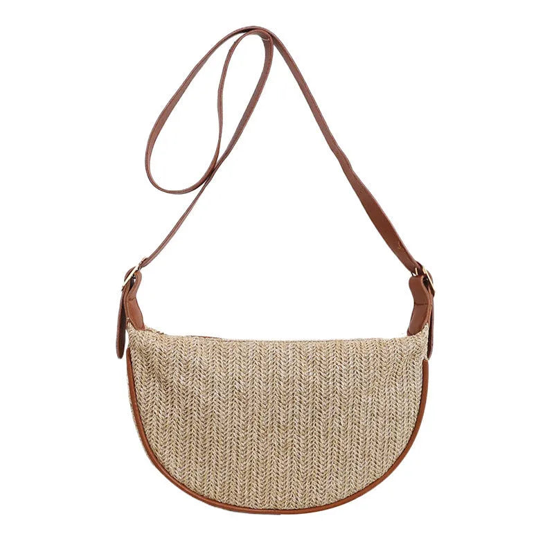 Women's straw woven crossbody bag with internal phone and document pockets in corrugated finish