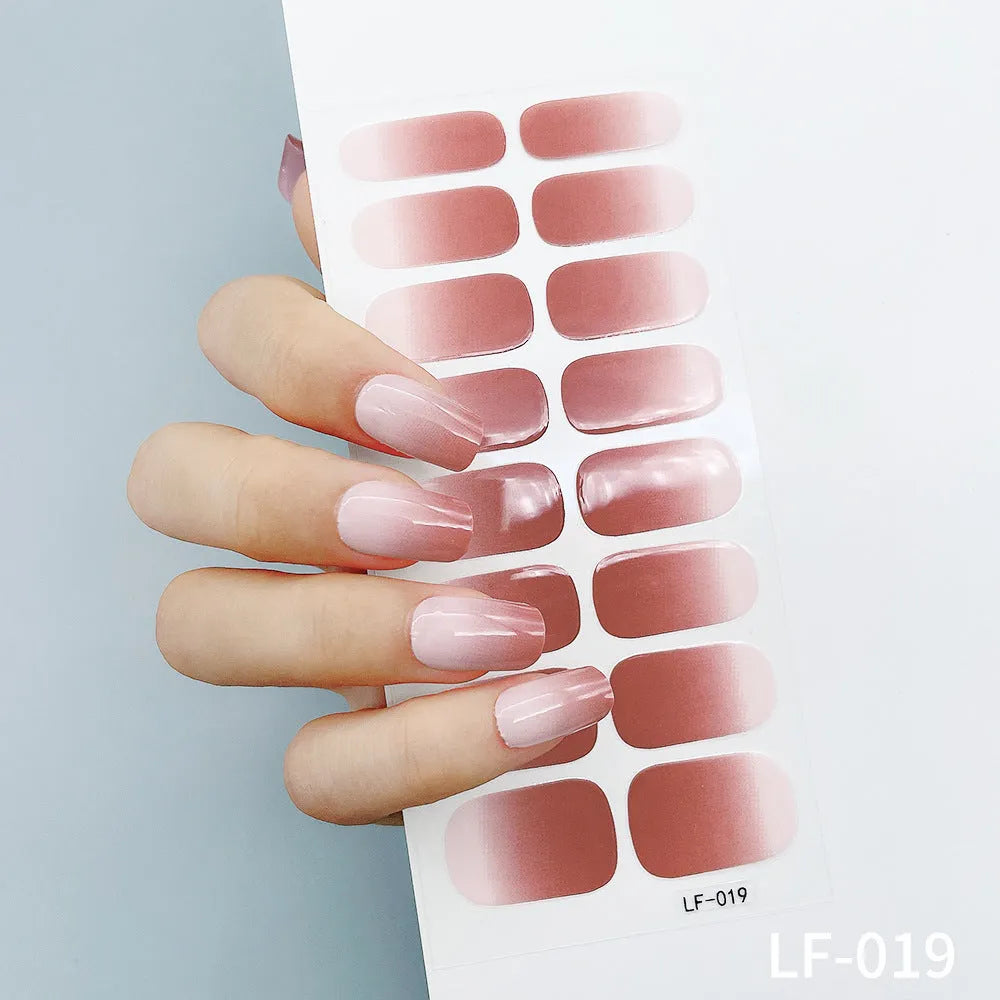 Full nail art sticker sheet showing 16 different solid colour designs including European simple nails and floral patterns
