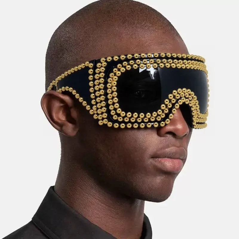 Men's punk style square sunglasses with large rim and rivet detailing in gold colour