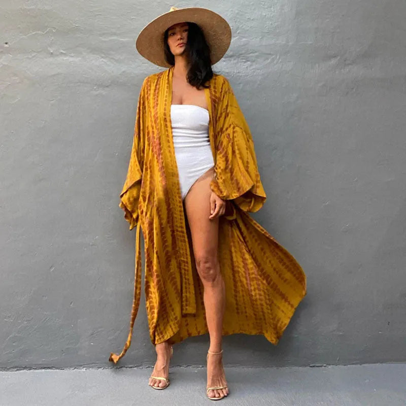 Women's printed cotton beach cover-up shirt in loose fit for sun protection over bikini.
