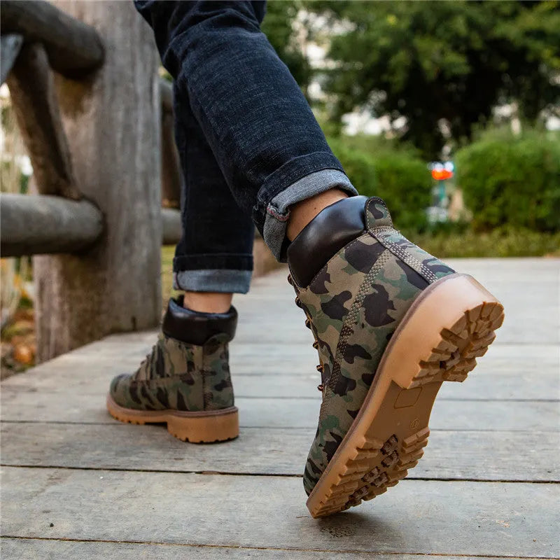 Men's pink high-top Martin boots with front lace-up and a low flat heel on a neutral background.