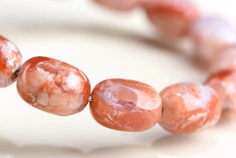 Natural cherry agate barrel bead bracelet with geometric shape and ruyi charm