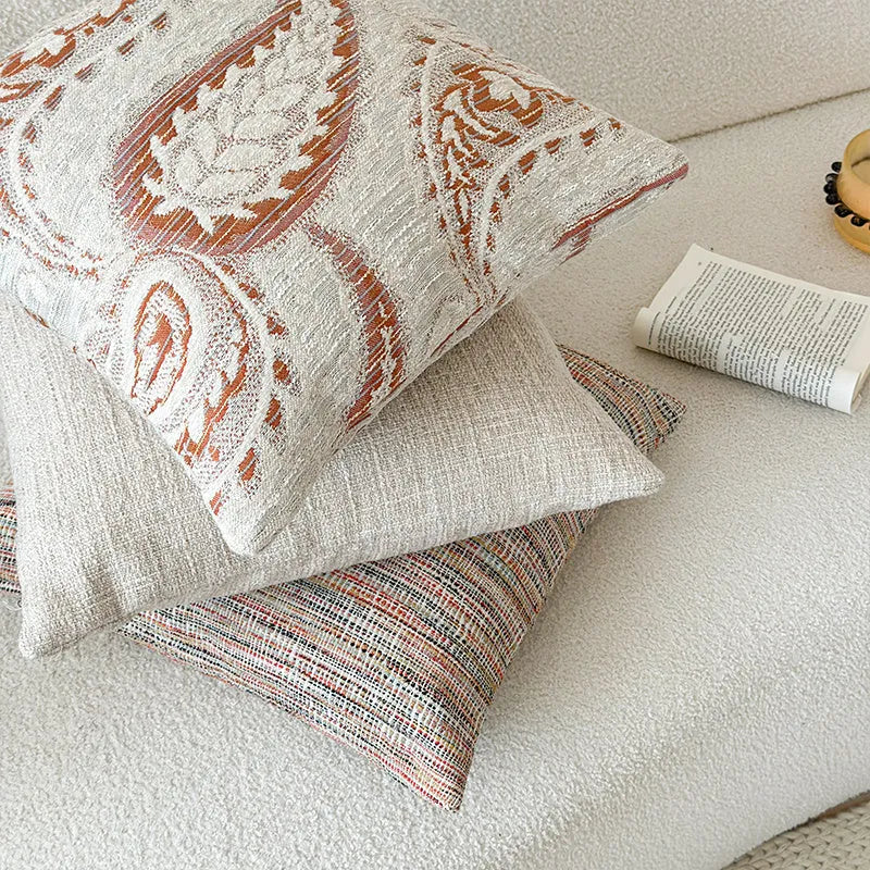 American-style jacquard sofa cushion cover with woven paisley and flower pattern in amber colours.