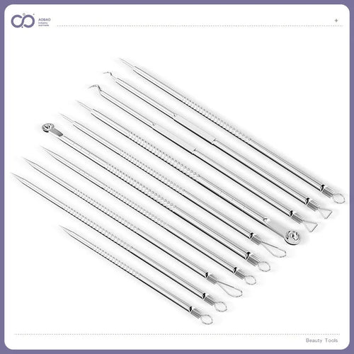 Set of four silver metal acne needles with pointed tips on a white background.