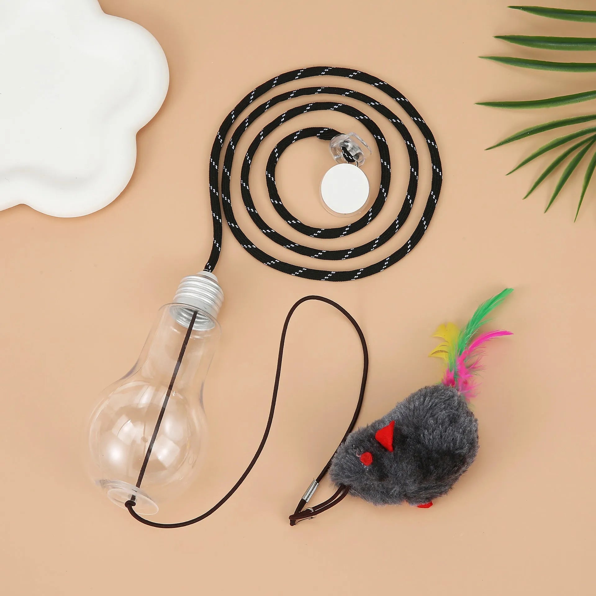 Interactive hanging cat toy with retractable elastic rope and dangling mouse attachment on door frame