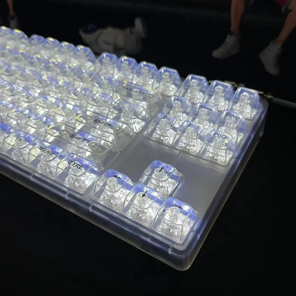 132 transparent plastic keyboard key caps arranged in complete set for universal keyboard replacement