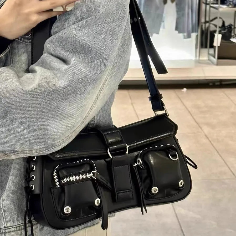 Black PU women's messenger bag with adjustable shoulder strap showing zippered compartment