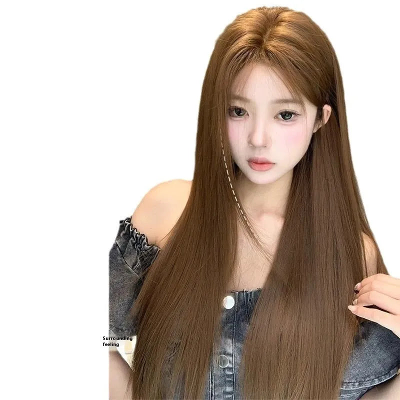 Warm brown long straight synthetic lace front wig with a centre part and side-swept bangs.