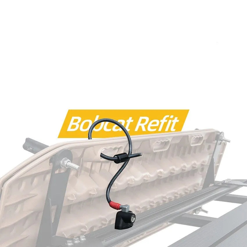 Plastic-sheathed steel cable lock for securing a kayak on a roof rack.