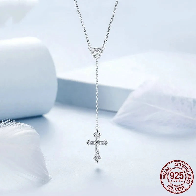 Sterling silver V-neck love cross pendant necklace on an O-ring chain in colour BSN384.