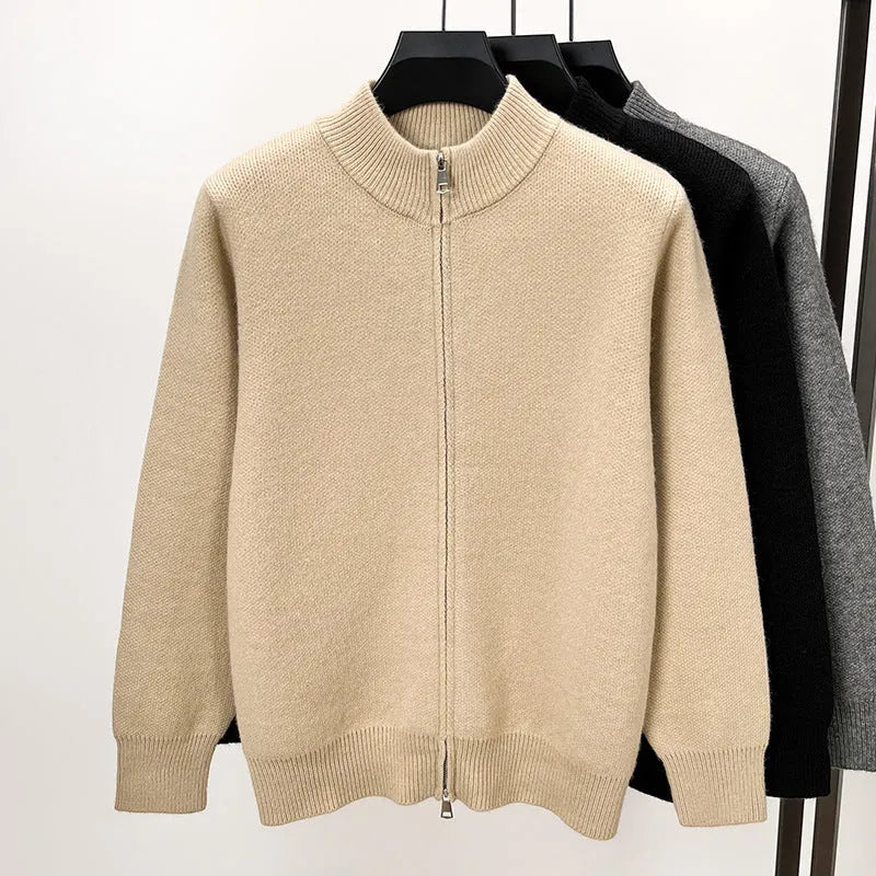 Man wearing a beige high collar zip-front knit cardigan, loose fit, long sleeves.