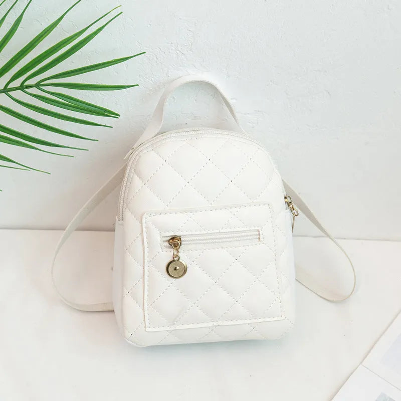 Girls' hard shell square backpack with Korean embroidery in black, pink or white colours showing sandwich pockets and carry handle