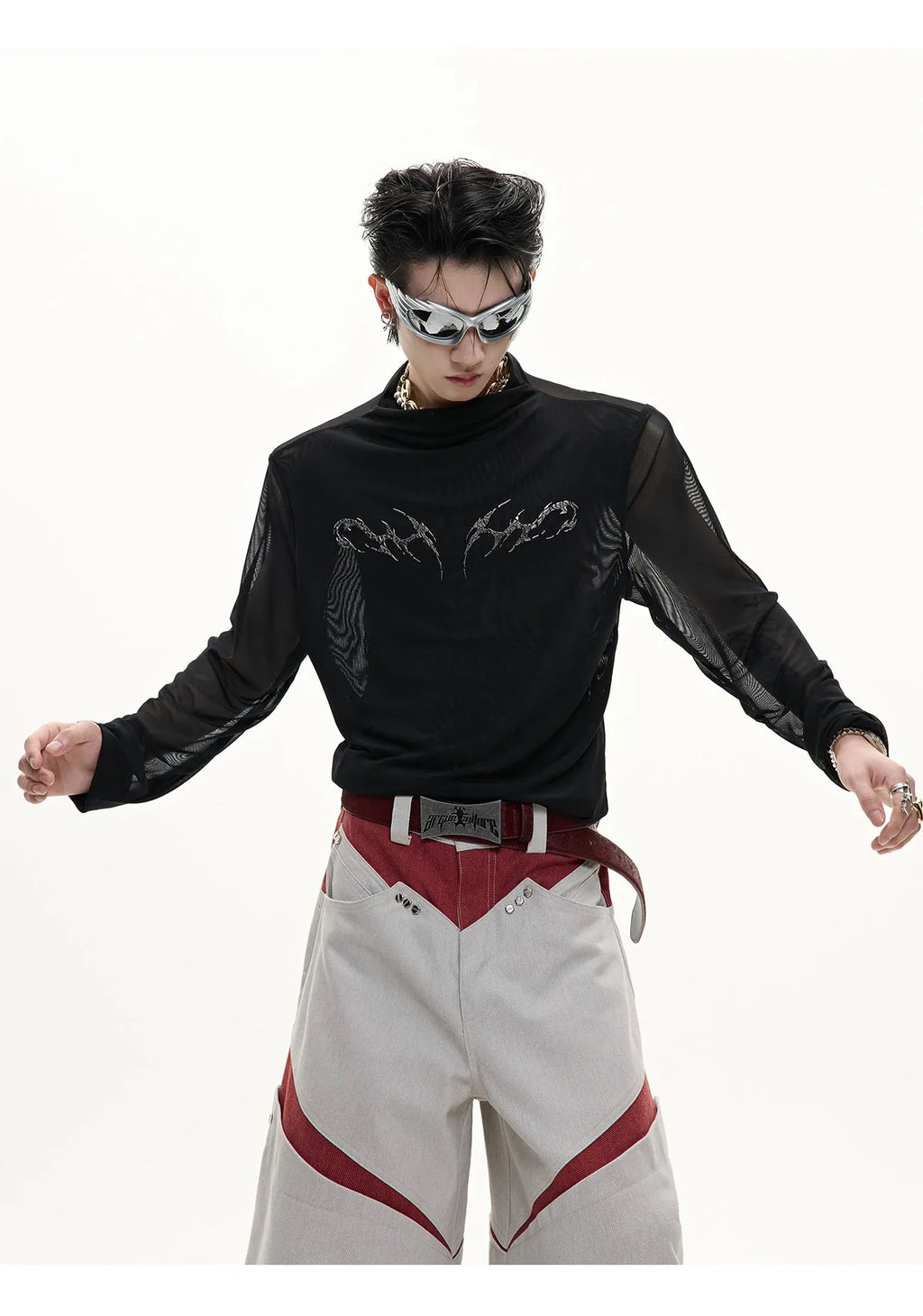 Men's black slim-fit mesh long-sleeve bottoming shirt laid flat, showing texture.