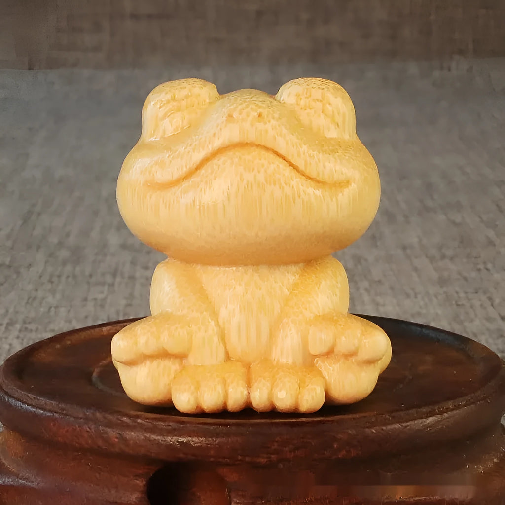 Smiling frog bamboo carving ornament measuring 5cm height with cartoon cute style decorative design