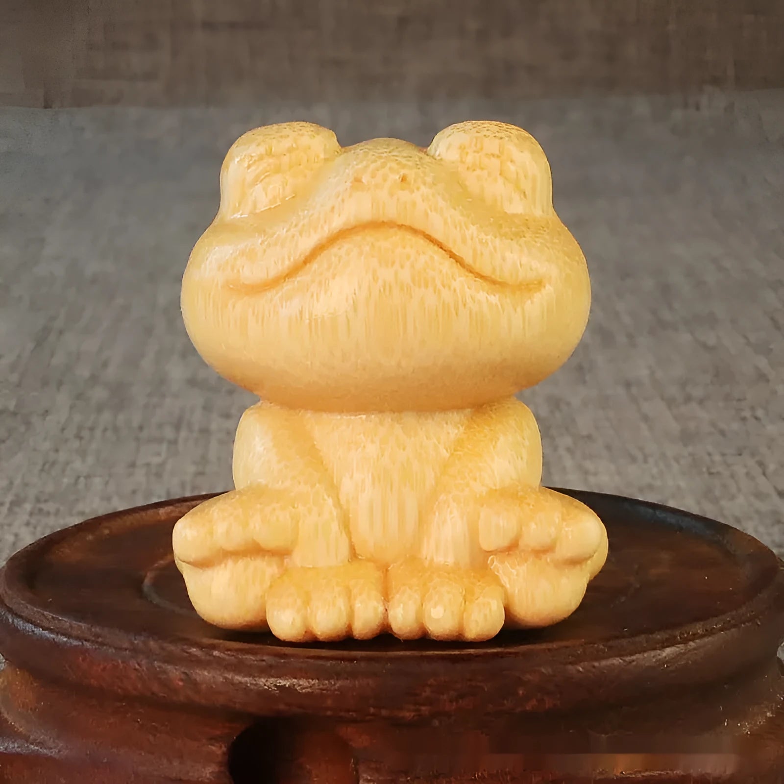 Smiling frog bamboo carving ornament measuring 5cm height with cartoon cute style decorative design