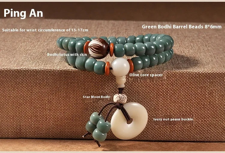 White Jade Bodhi Green Sandalwood Bracelet with Bodhi seed beads, lotus charms, and a double ring safety clasp.