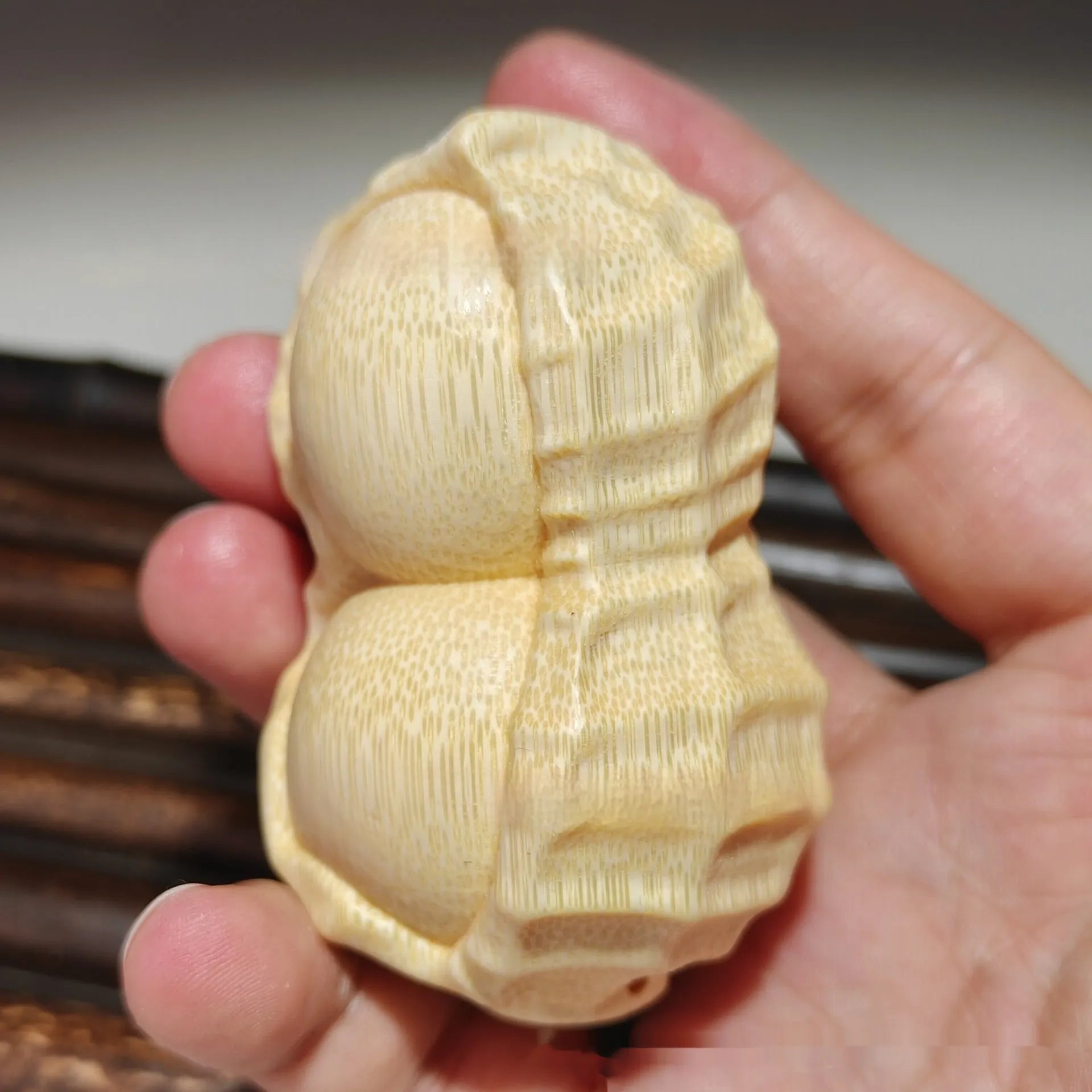 Natural bamboo carving peanut ornament with modern minimalist design and meaningful size detail