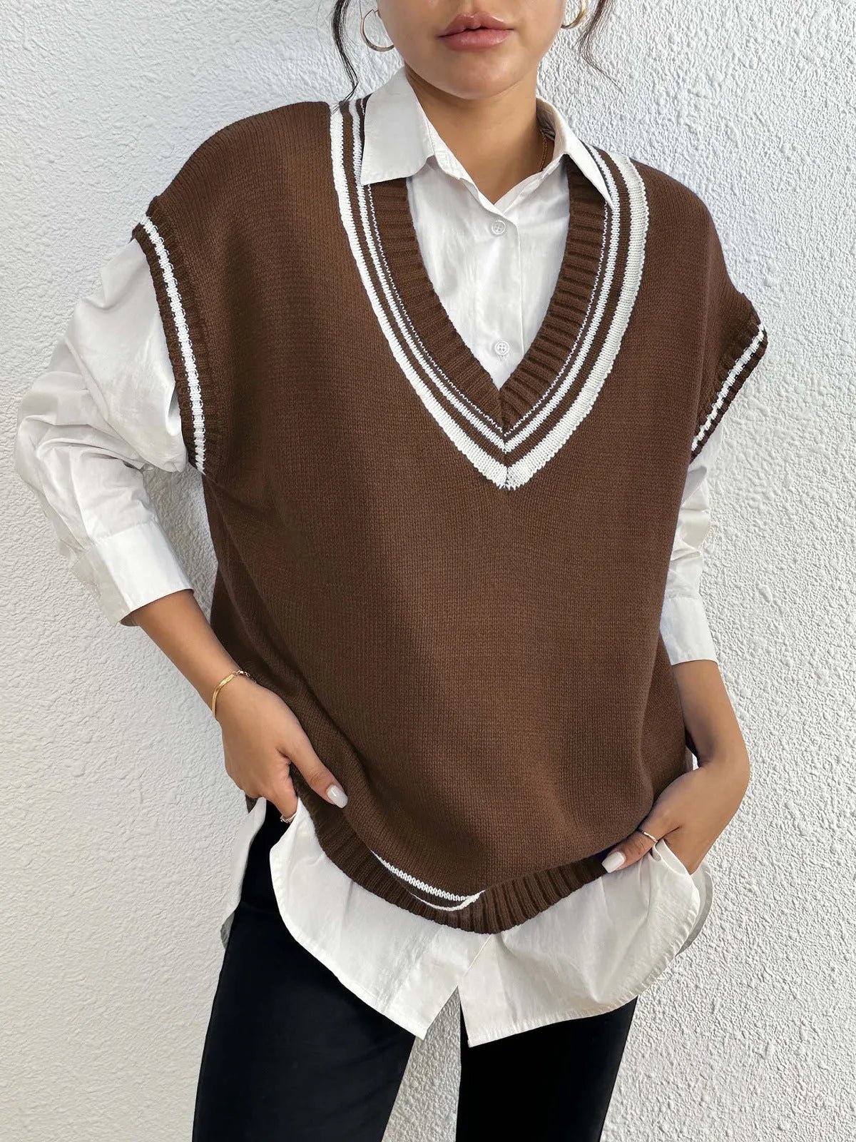 Women's college style casual vest sweater in loose fit with acrylic polyester blend fabric