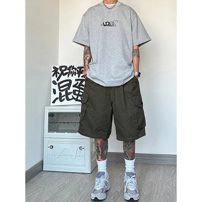 Loose straight-leg casual shorts in blue, American sport style, made from polyester fabric.