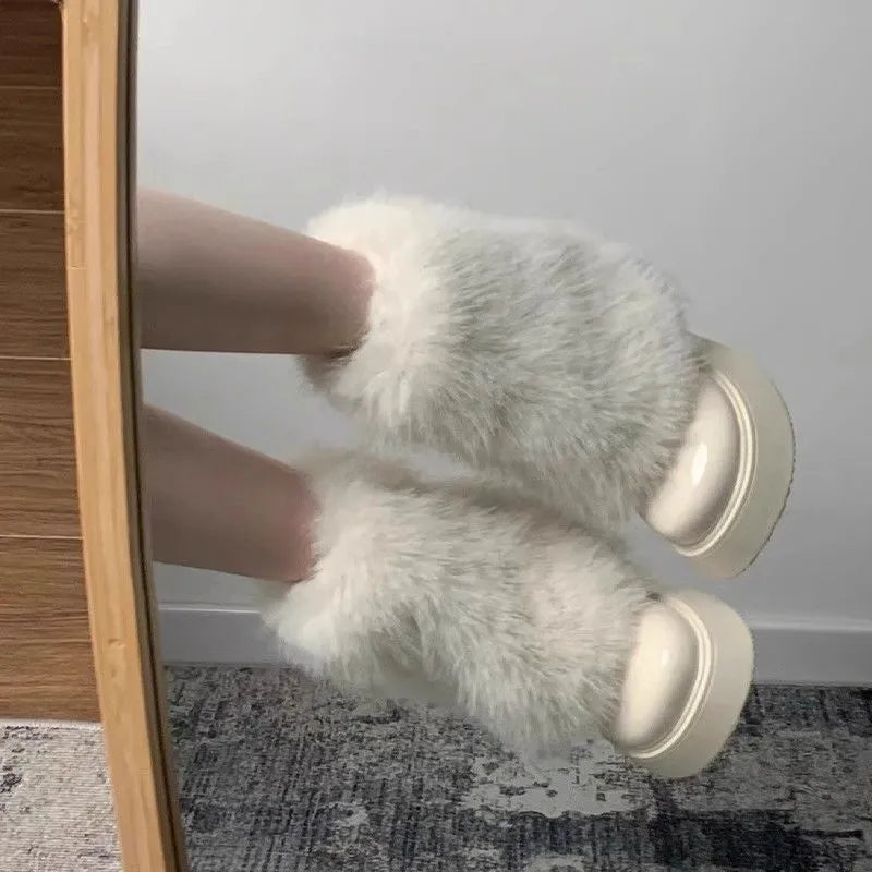 Women's black artificial plush snow boots with fleece lining and waterproof platform sole