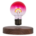 Magnetic suspension love night lamp with floating bulb, geometric modern art design, 80mm diameter, rainbow light on desk