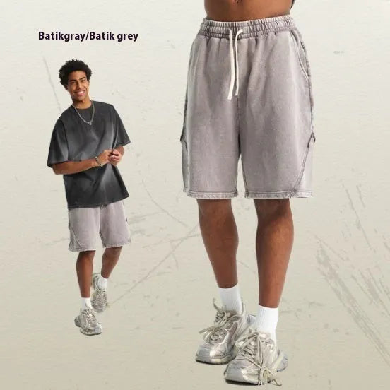 Men's batik washed cotton terry shorts in loose retro style with patchcraft colour effects