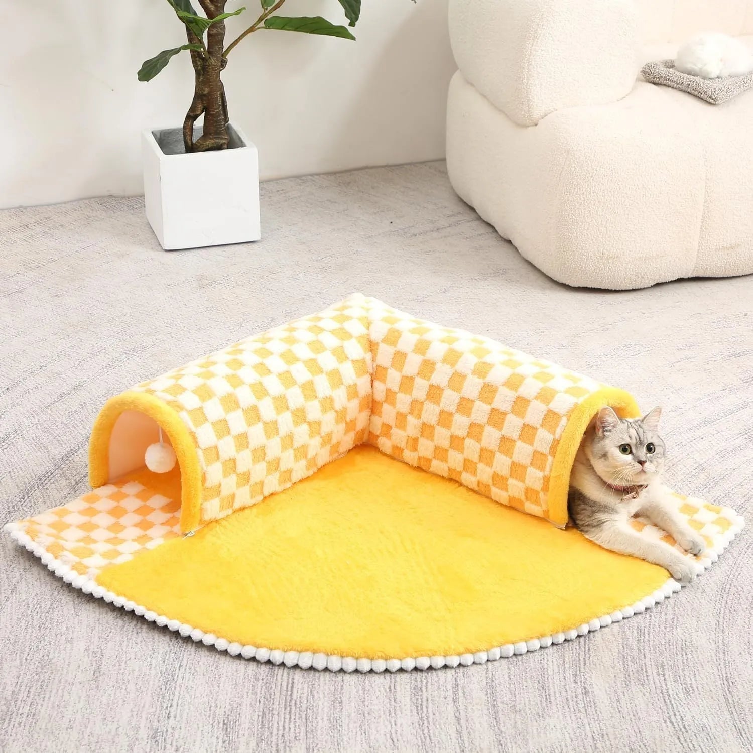 XL coffee coloured plush fan-shaped pet bed with a tunnel for dogs and cats on a wooden floor.