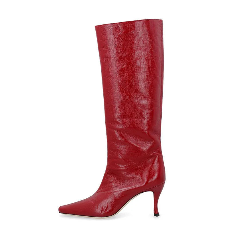 Women's square toe cowboy boot in a selection of colours including black, snake pattern, and brown stone.