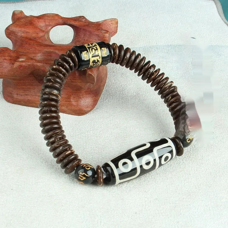 Agate Tibetan dzi bead bracelet with three-eye design and polished finish