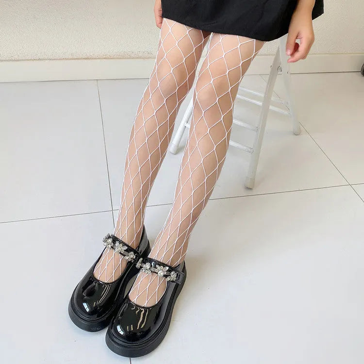 Women's black and white mesh stockings showing large, medium, and small net patterns on a leg.