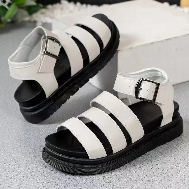 Black outdoor sandals with thick rubber sole, PU upper, and adjustable fish mouth toe holder with strap buckle.